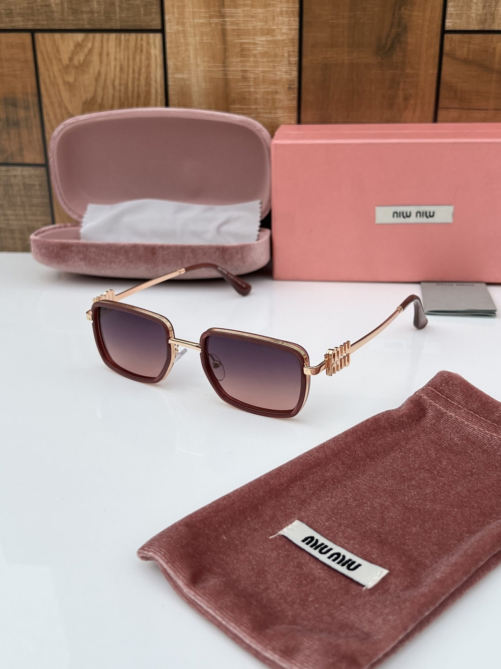 Miu_miu_559_gold_pink